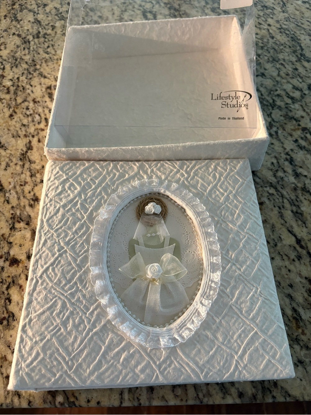 Lifestyle studio wedding album original box white lace around center w/ bride